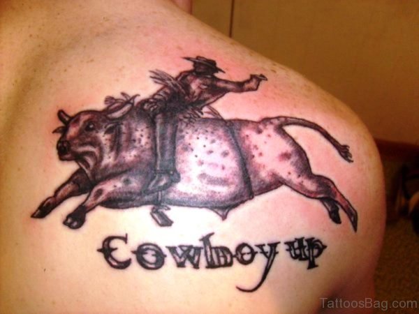 Cowboy Riding Bull Tattoo Design