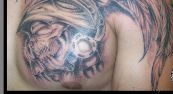 Crawling Aztec Skull Tattoo On Chest