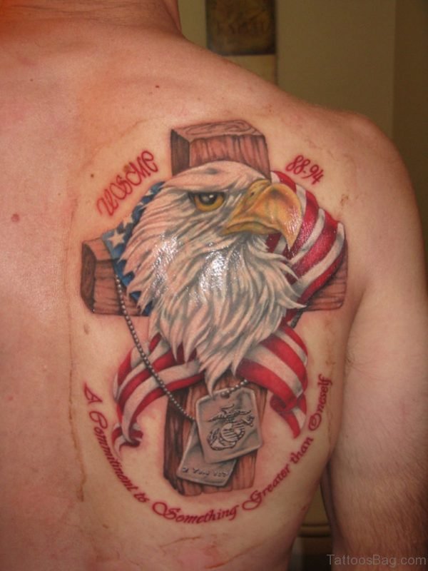 Cross And Eagle Head Tattoo On Back