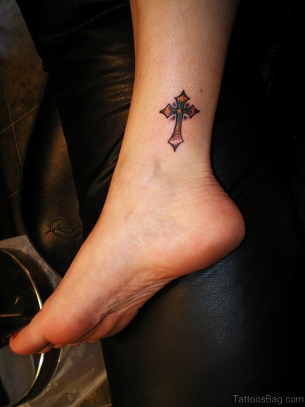 Cross Tattoo On Right Ankle
