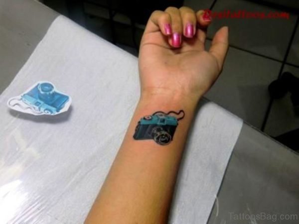 Cute Blue Camera Tattoo On Wrist