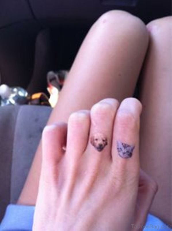 Cute Dog And Cat Tattoo On Finger