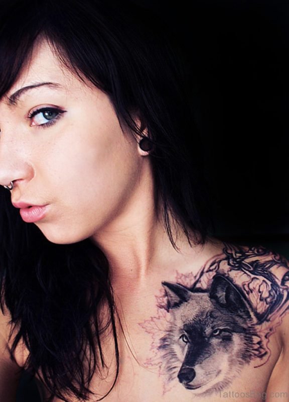 Cute Girl Showing Her Wolf Tattoo