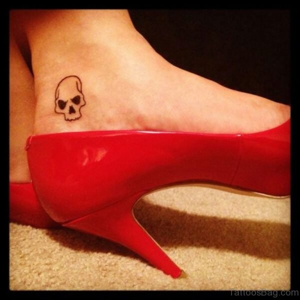 Cute skull ankle tattoo