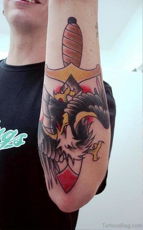 Dagger With Eagle Tattoo On Heart