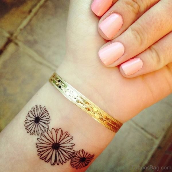Daisy Wrist Tattoo