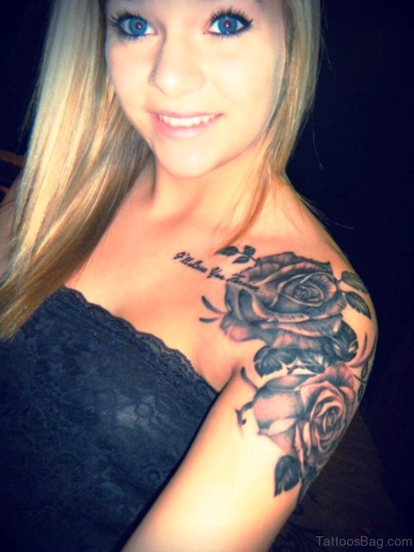 Dark Black Flower Tattoo On Shoulder