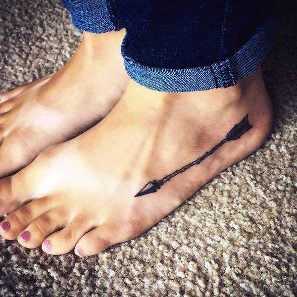 Dazzling Arrow Tattoo On Foot