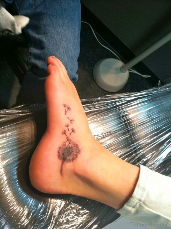 Delightful Dandelion Tattoo On Foot