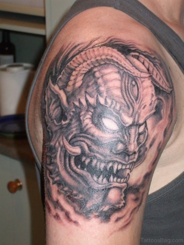 Demon Mask Tattoo On Shoulder