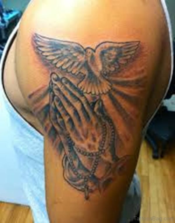 Dove And Praying Hands Tattoo On Shoulder