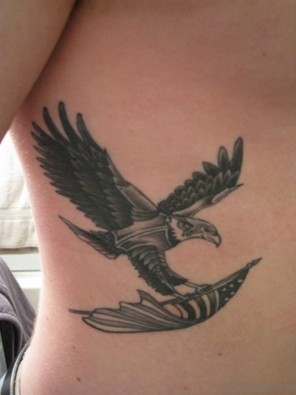 Eagle Holding Flag Tattoo