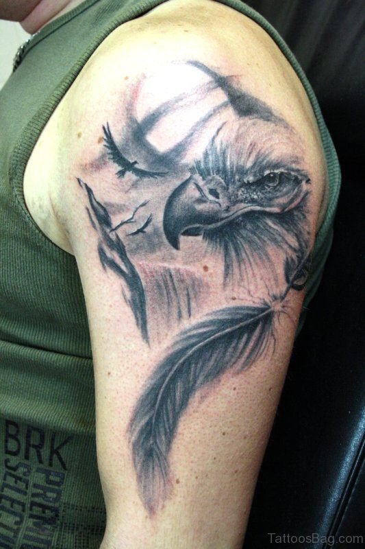 Eagle With Feather Tattoo Design