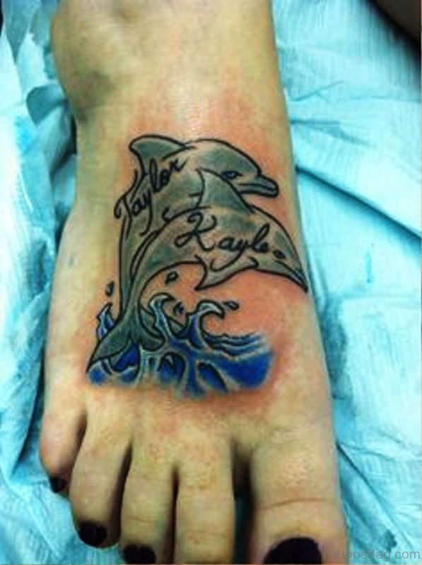 Elegant Dolphins Tattoo On Foot
