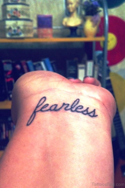 Elegant Fearless Wrist Tattoo 
