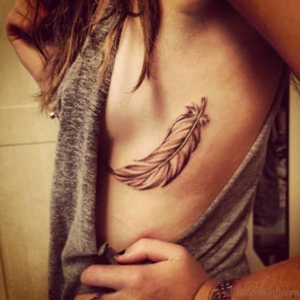 Elegant Feather Tattoo On Rib