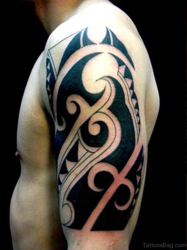 Elegant Maori Shoulder Tattoo