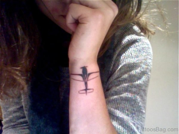 Elegant Plane Tattoo On Wrist