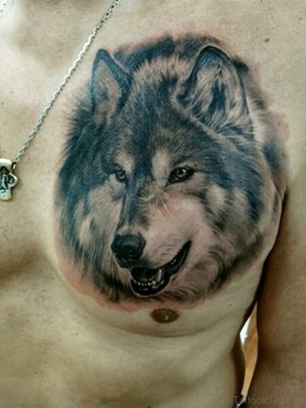 Elegant Wolf With Blue Eyes Tattoo On Chest