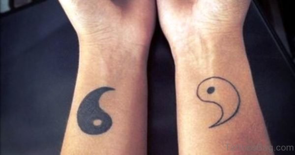Elegant Yin Yang Tattoo On Wrist