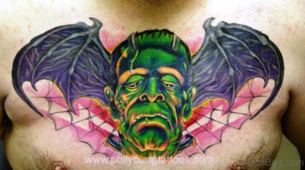 Evil Face Bat Wing Tattoo On Chest