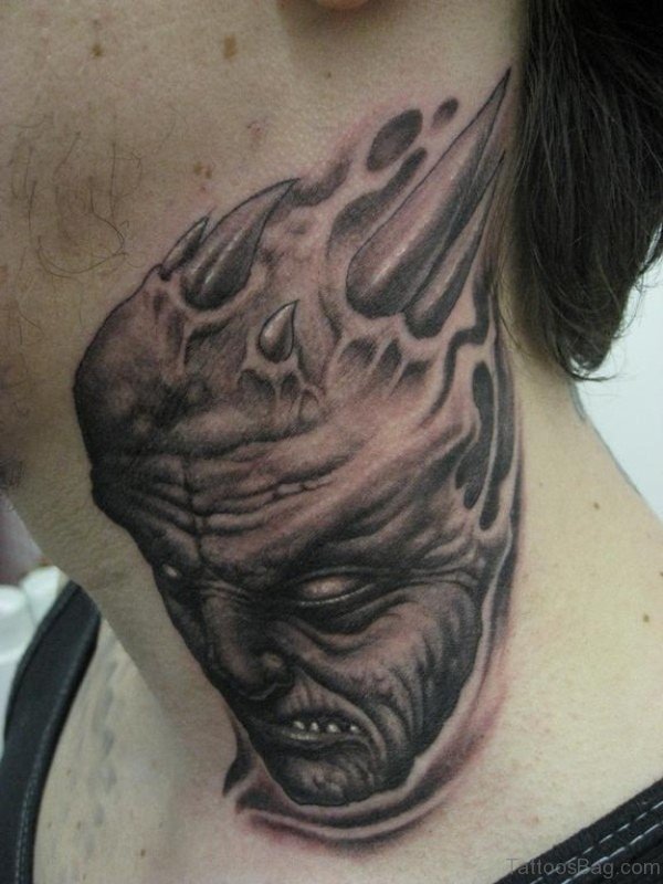 Evil Face Tattoo On Neck 
