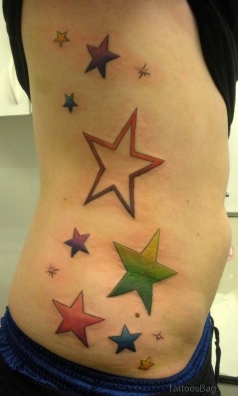 Excellent Star Tattoo On Rib Image