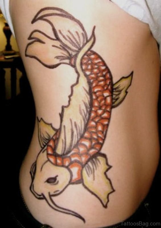 Fancy Fish Tattoo On Rib