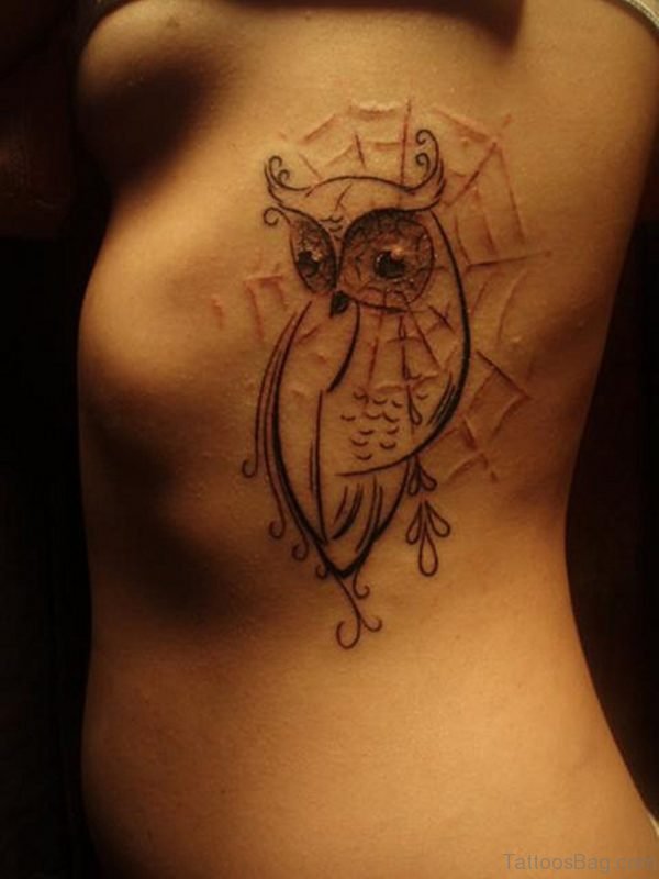 Fancy Owl Tattoo On Rib