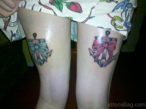Feminine Bow n Anchor Tattoos On Thigh