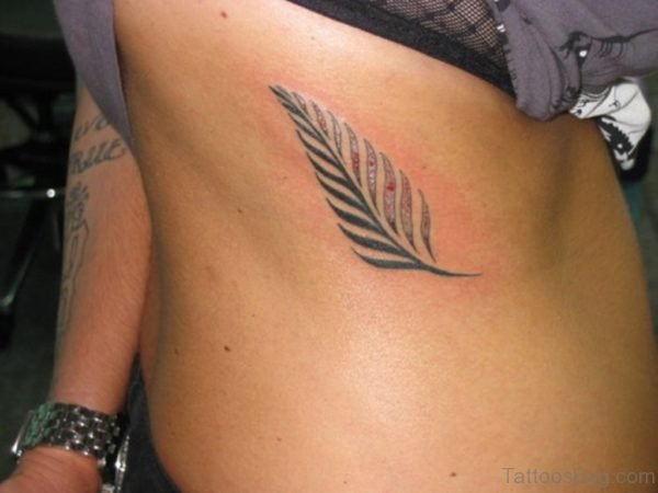 Fern Tattoo On Side Of the Chest