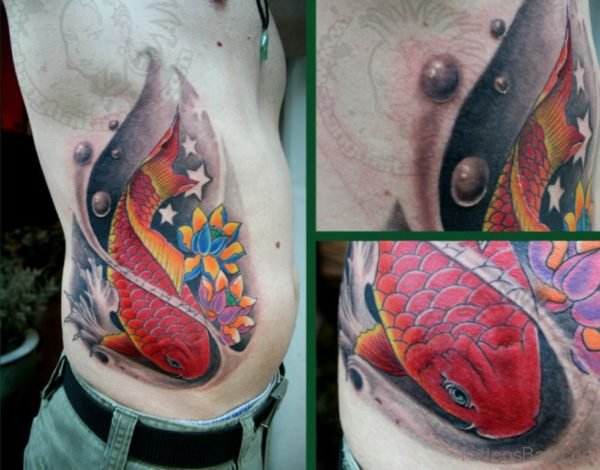 Fish And Flower Tattoo On Rib