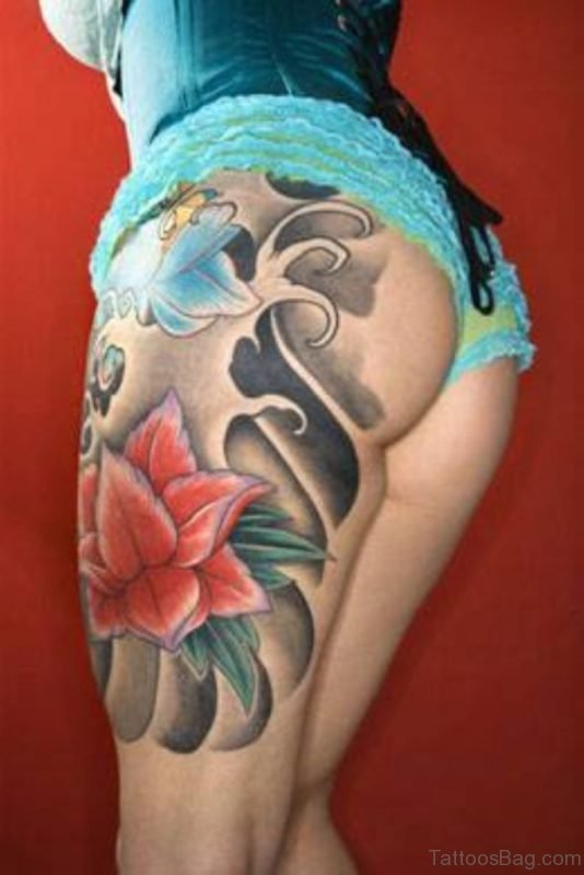 Fish And Flower Tattoo On Thigh 