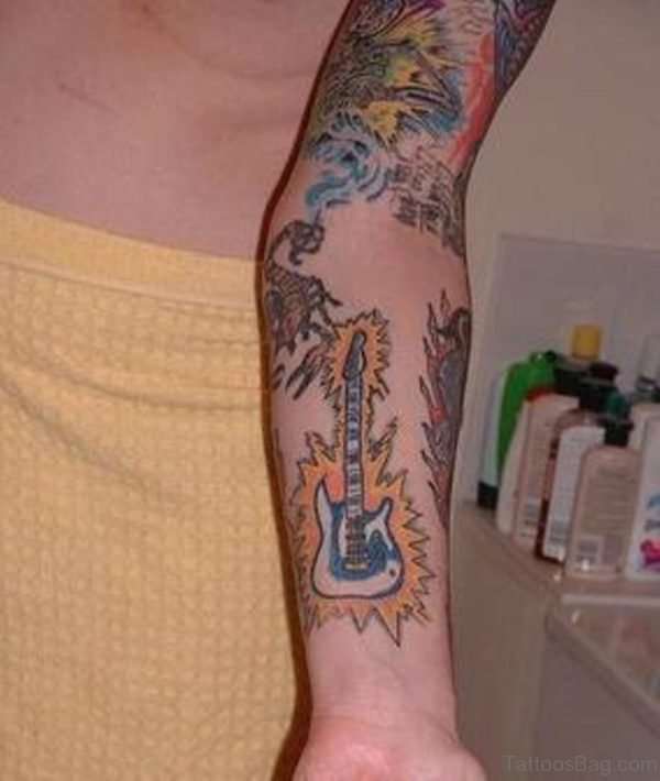 Flaming Guitar Tattoo On Wrist