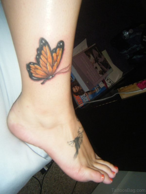 Flying Butterfly Tattoo On Ankle For Women