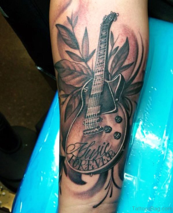 Forearm Guitar Tattoo With Leaves