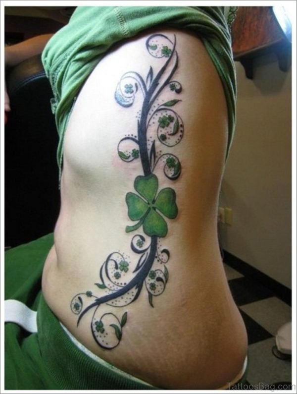 Four Leaf Clover Tattoo On Chest