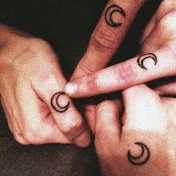 Four Moon Tattoo On Finger