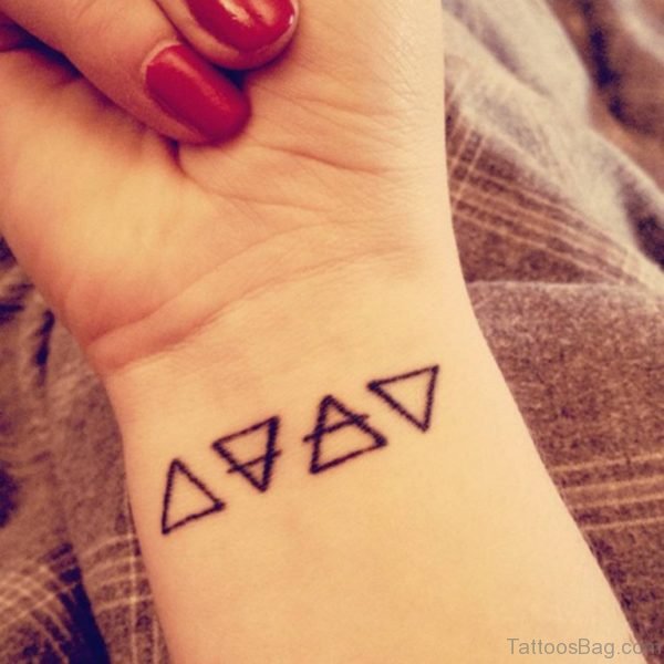 Four Triangle Wrist Tattoo