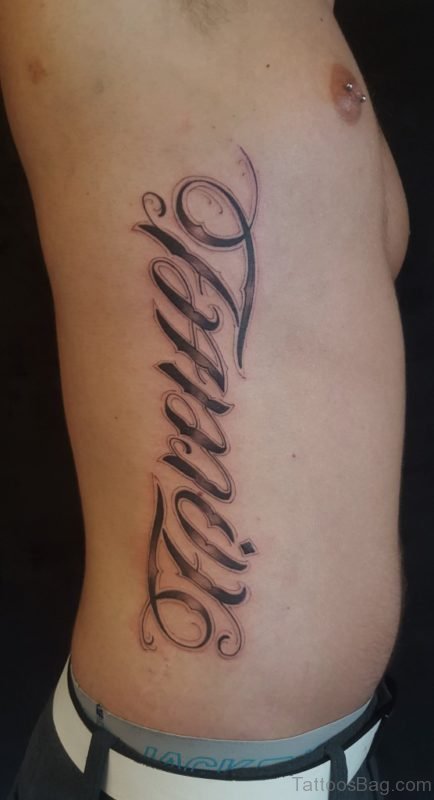 Funky Ambigram Tattoo On Rib