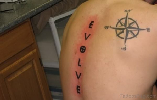 Geek Compass Tattoo On Back