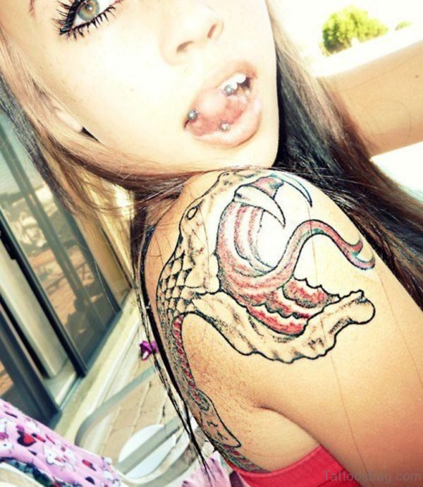 Girl Showing Her Snake Tattoo