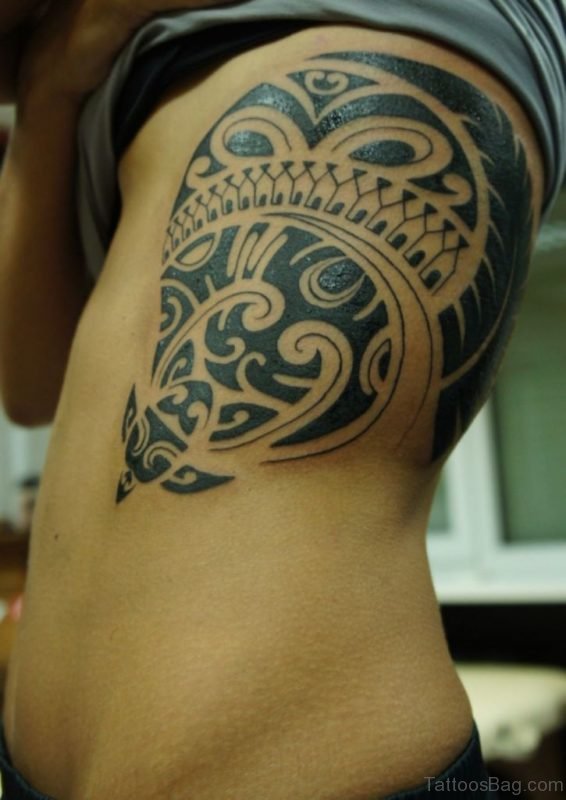 Good Looking Tribal Tattoo On Rib