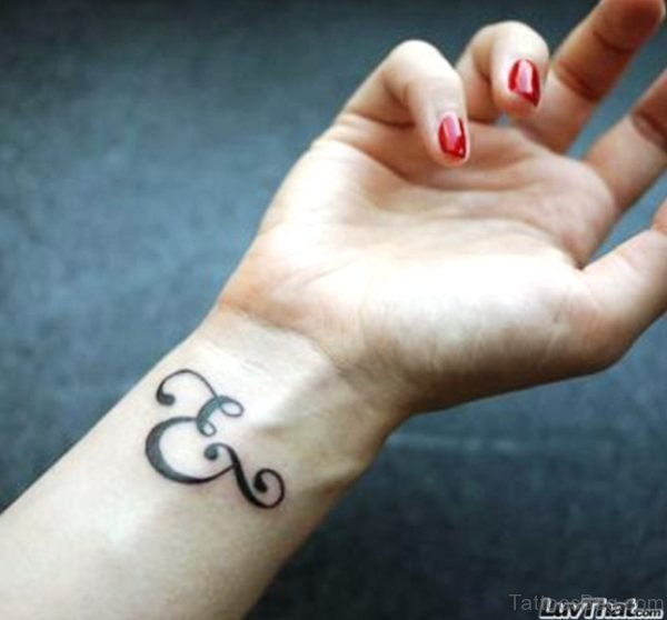 Graceful Ampersand Wrist Tattoo