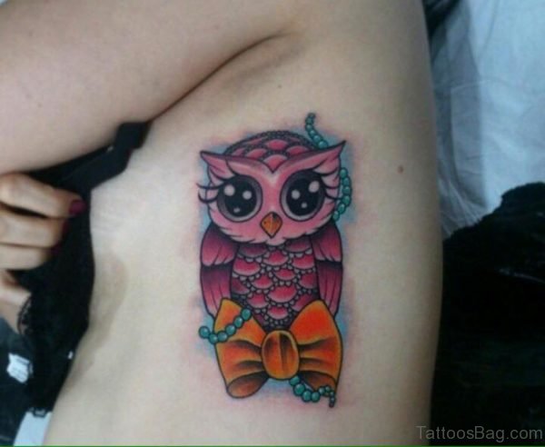 Graceful Owl Tattoo On Rib