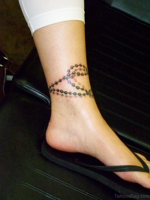 Graveyard Tattoo On Girls Ankle
