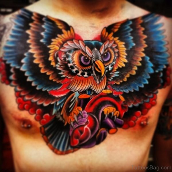 Great Color Owl With Heart Tattoo On Chest