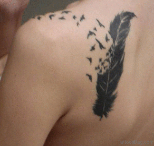Great Grey Ink Feather Tattoo On Girl Right BAck