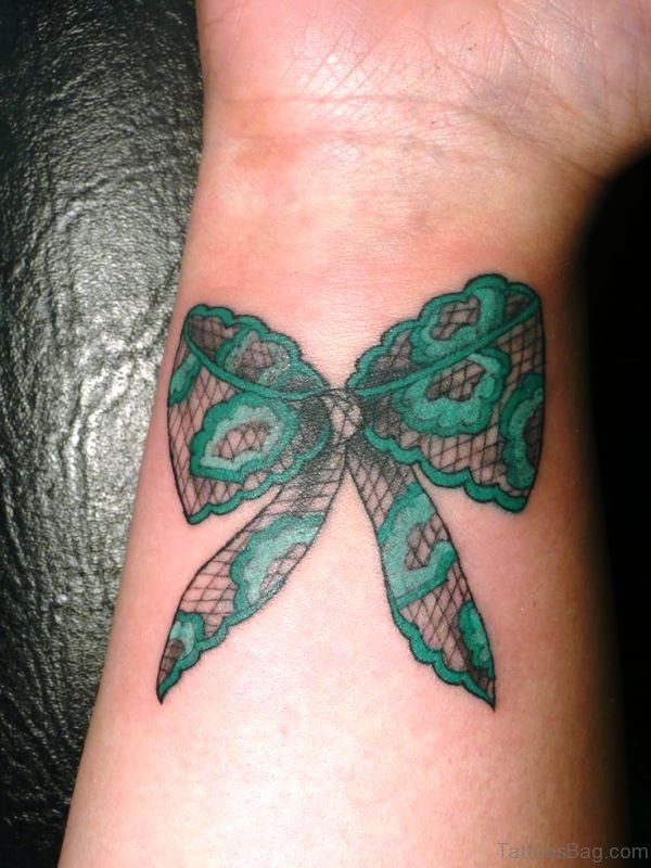 Green Bow Tattoo on Wrist