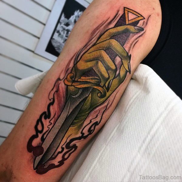 Green Hands Holding Dagger Tattoo Design